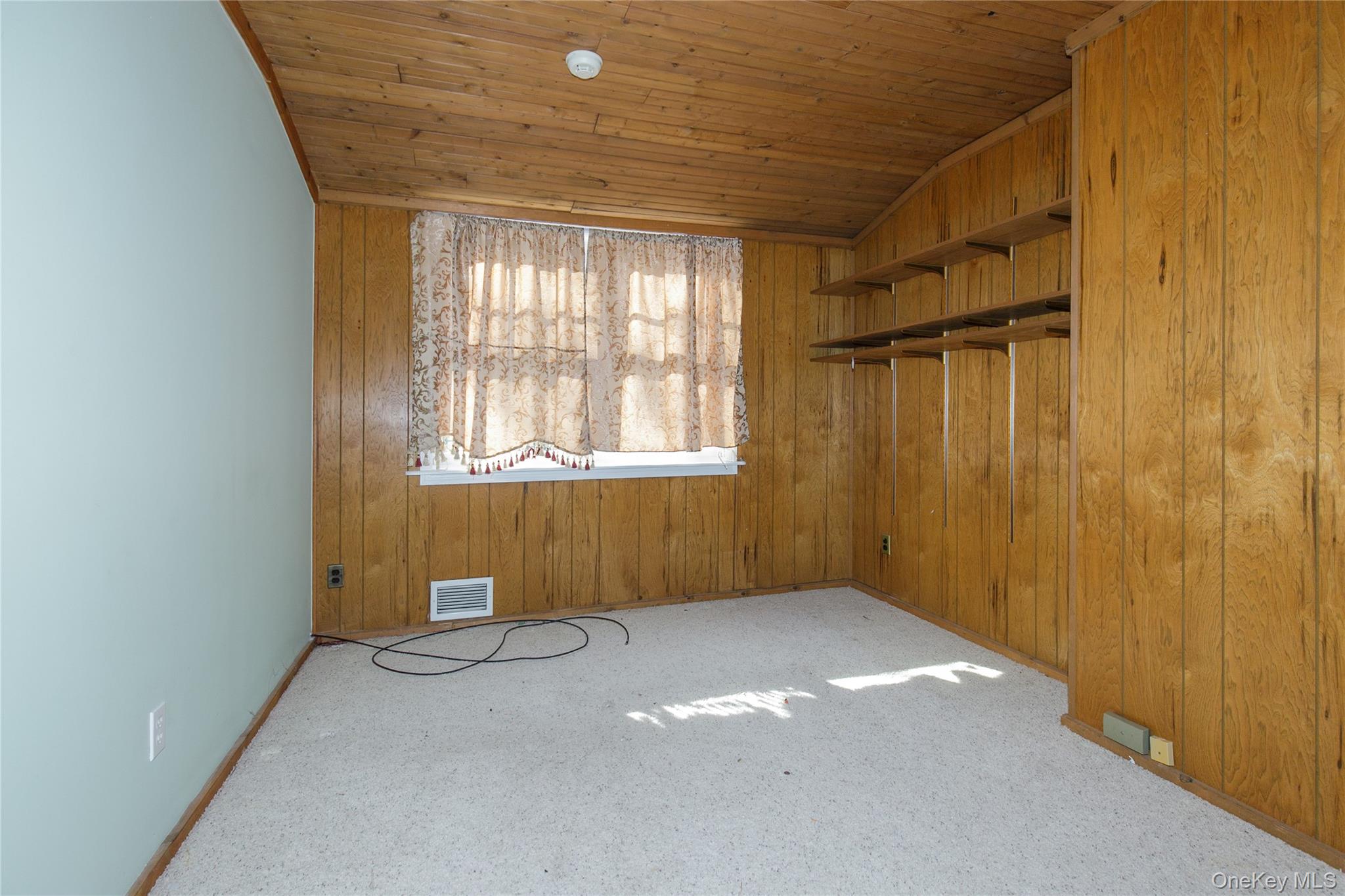 18 Lighthouse Road Kings Point, NY 11024 - Photo 23 of 36 a view of an empty room with a window