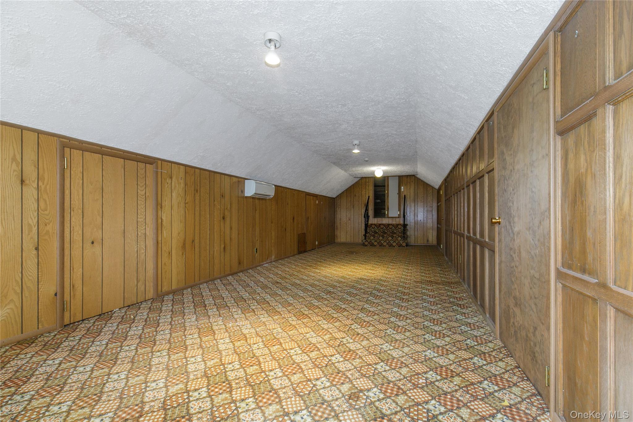 18 Lighthouse Road Kings Point, NY 11024 - Photo 26 of 36 a view of hallway with stairs