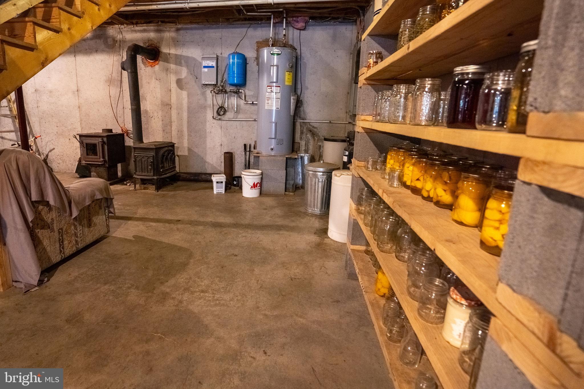 1950 Mesner Road Berkeley Springs, WV 25411 - Photo 27 of 34 a view of living room with furniture and stairs