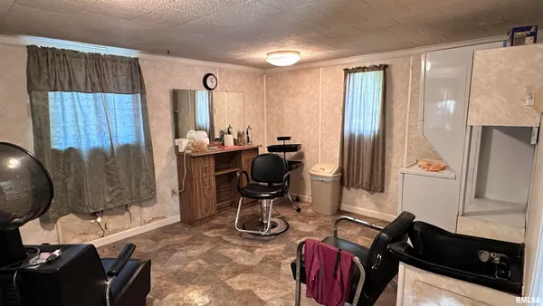 a workspace with furniture and window