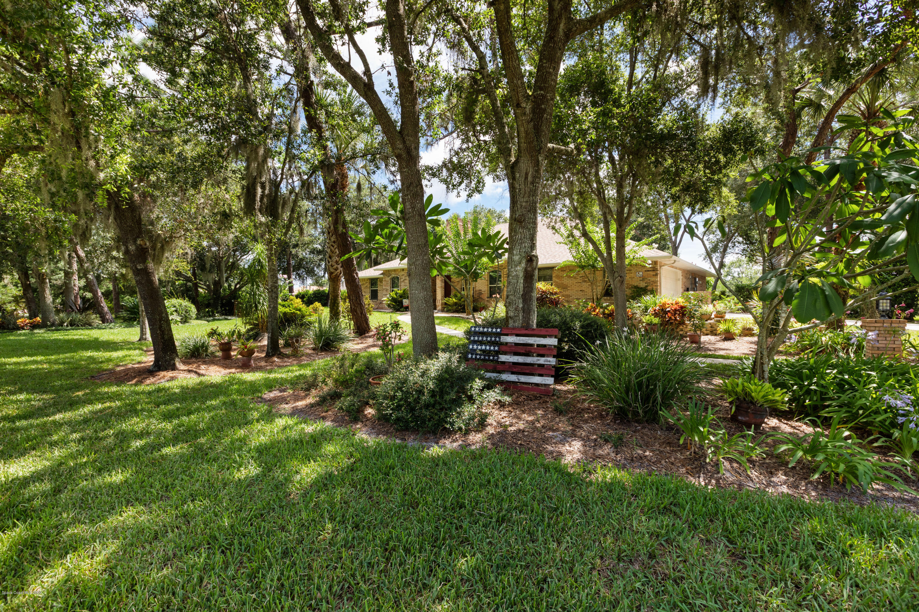 4255 Turtle Mound Road Melbourne, FL 32934 - Photo 43 of 46 a view of backyard with green space