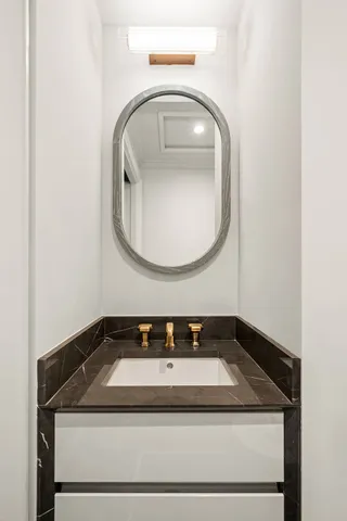 a view of a livingroom with furniture and a window