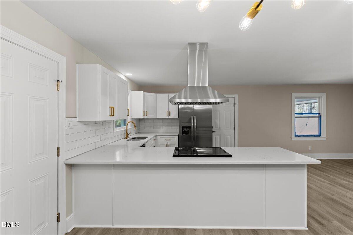 2501 Old Mill Road Rocky Mount, NC 27803 - Photo 16 of 41 a kitchen with a refrigerator and a sink