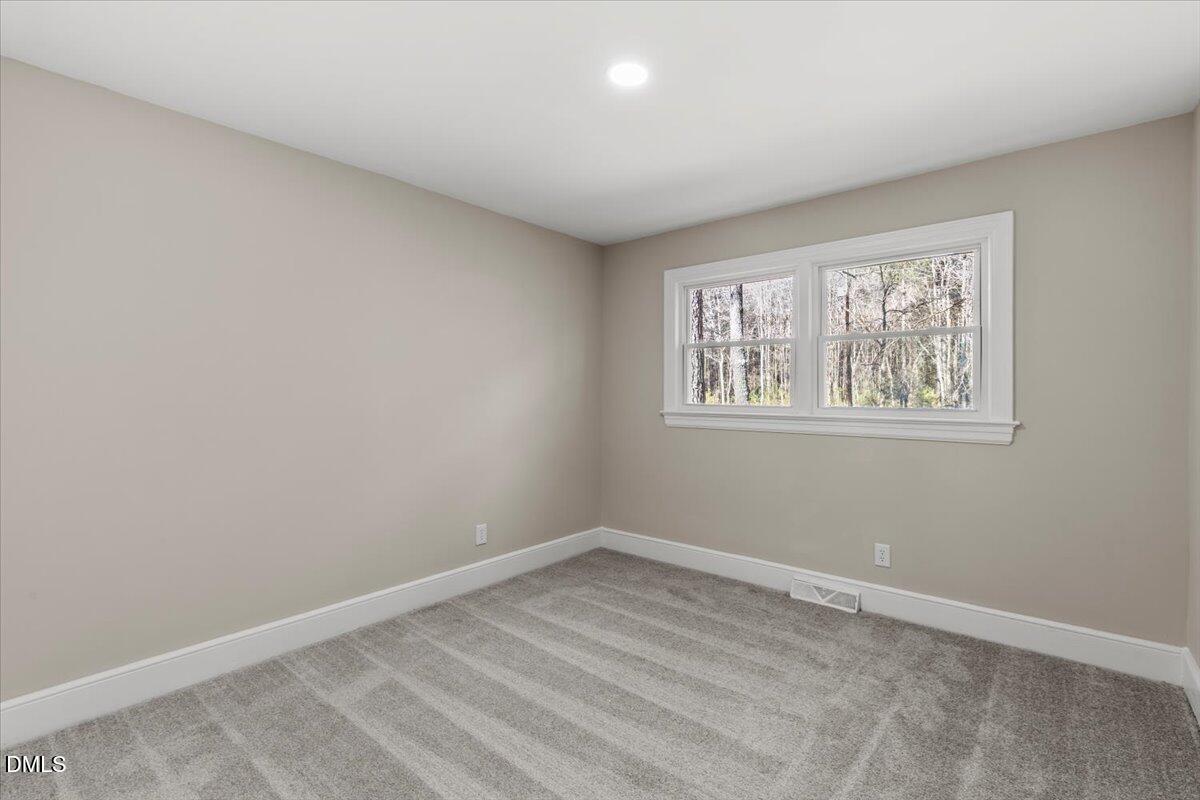 2501 Old Mill Road Rocky Mount, NC 27803 - Photo 21 of 41 a view of empty room with window