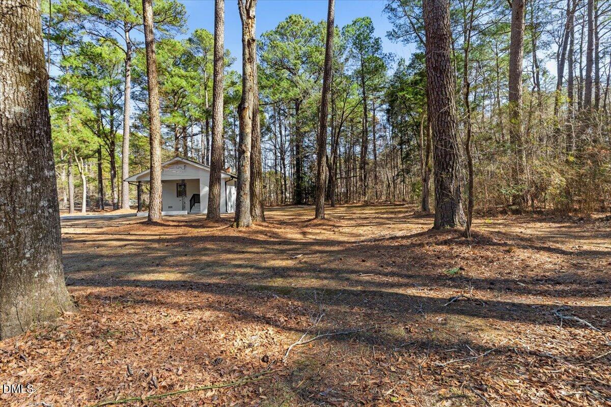 2501 Old Mill Road Rocky Mount, NC 27803 - Photo 35 of 41 a front view of a house with a yard