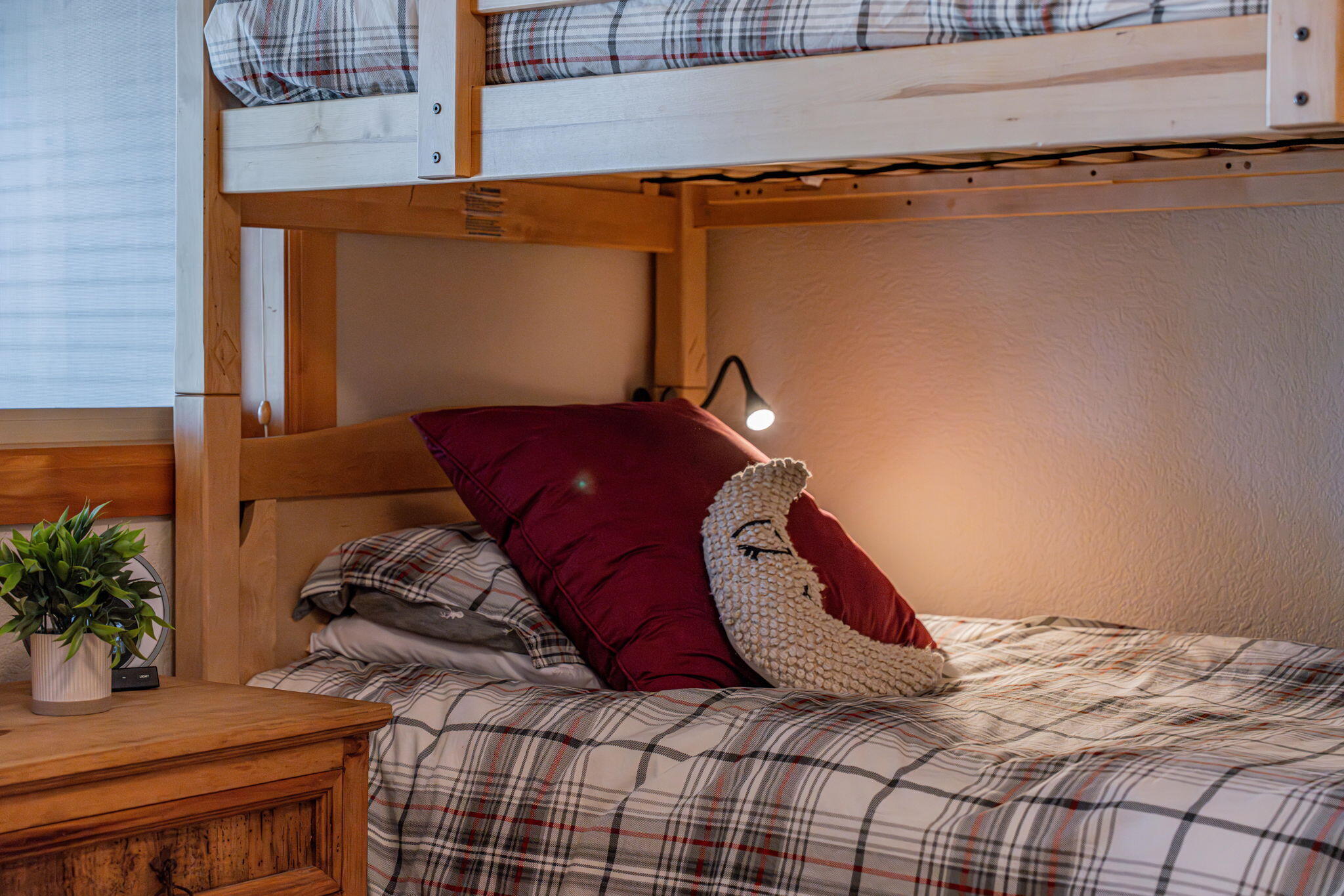 17948 Shadow Lane, Unit 7 Sunriver, OR 97707 - Photo 61 of 92 a bed sitting in a bedroom next to a window