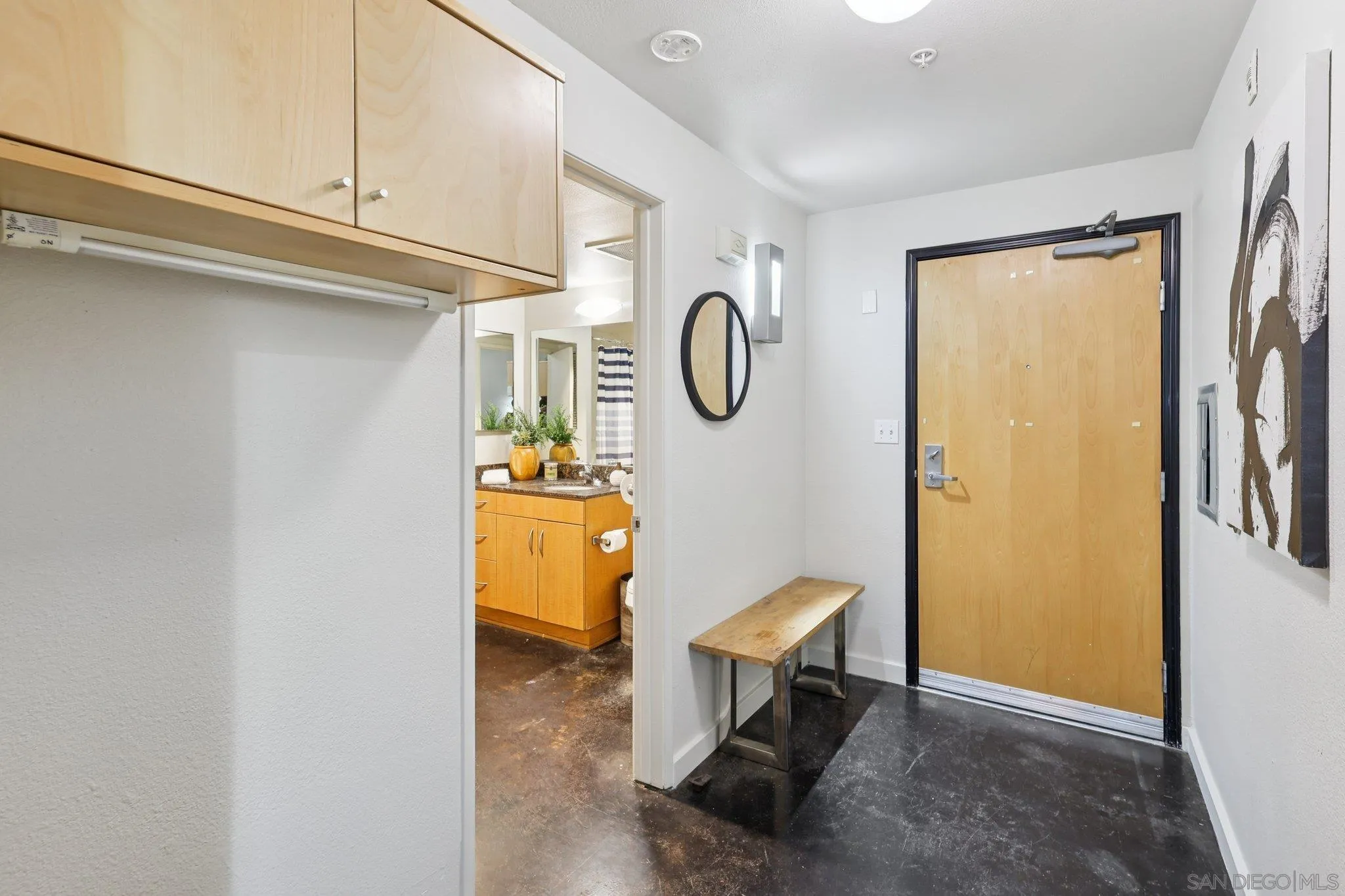 777 Sixth Avenue, Unit 135 San Diego, CA 92101 - Photo 22 of 38 a view of storage and utility room with racks on the wall