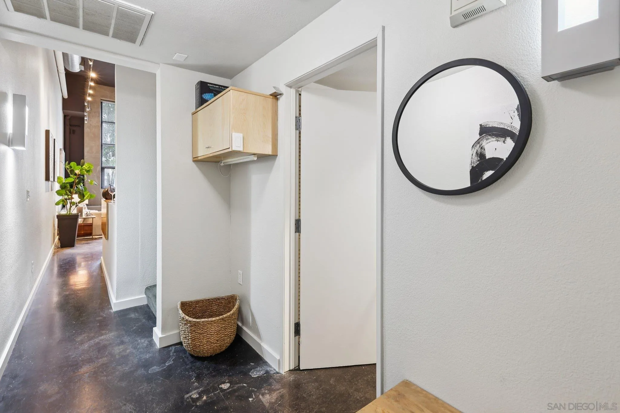 777 Sixth Avenue, Unit 135 San Diego, CA 92101 - Photo 24 of 38 a view of a hallway with interior of the house