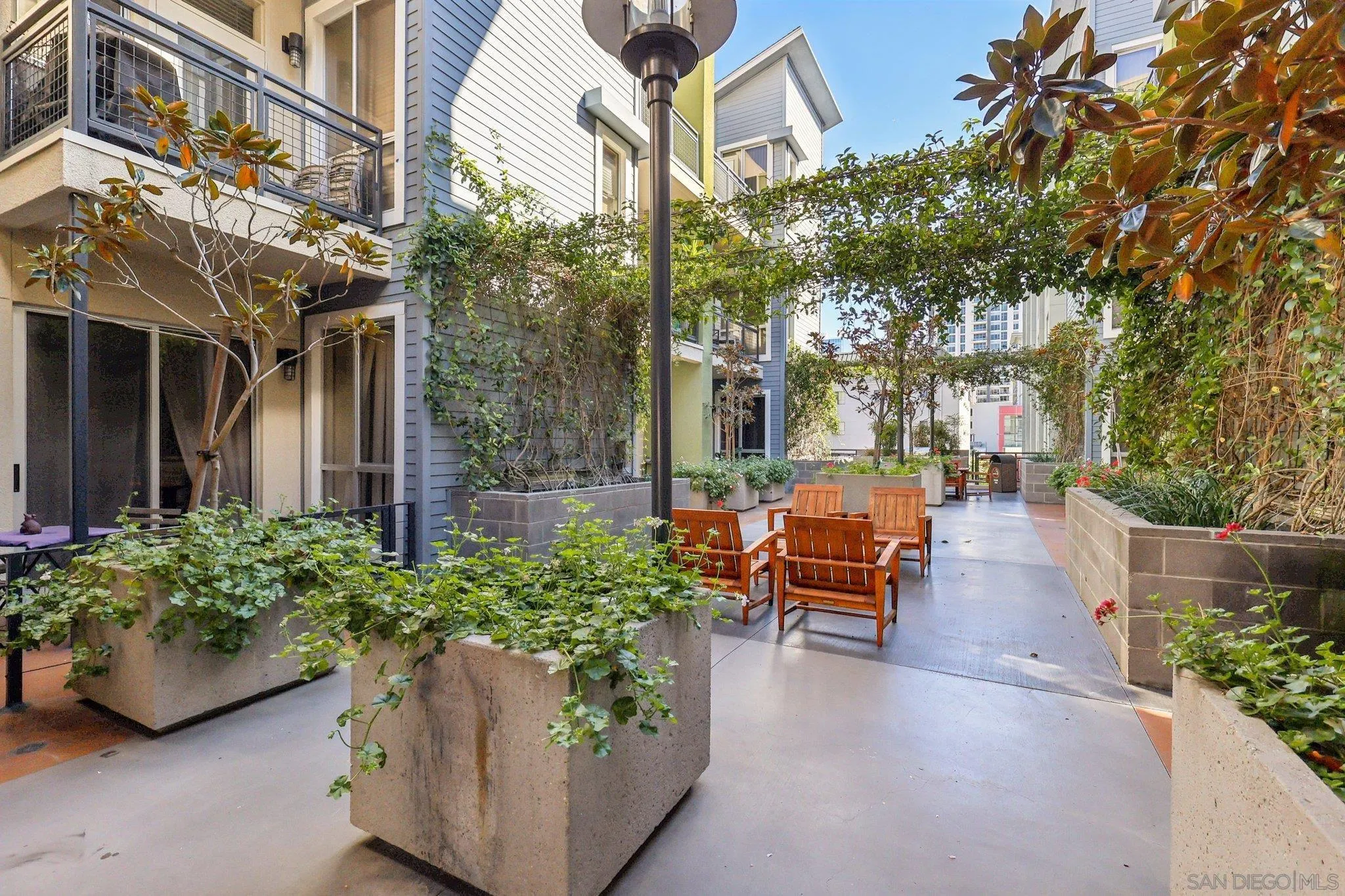 777 Sixth Avenue, Unit 135 San Diego, CA 92101 - Photo 28 of 38 a view of a patio with couches and potted plants