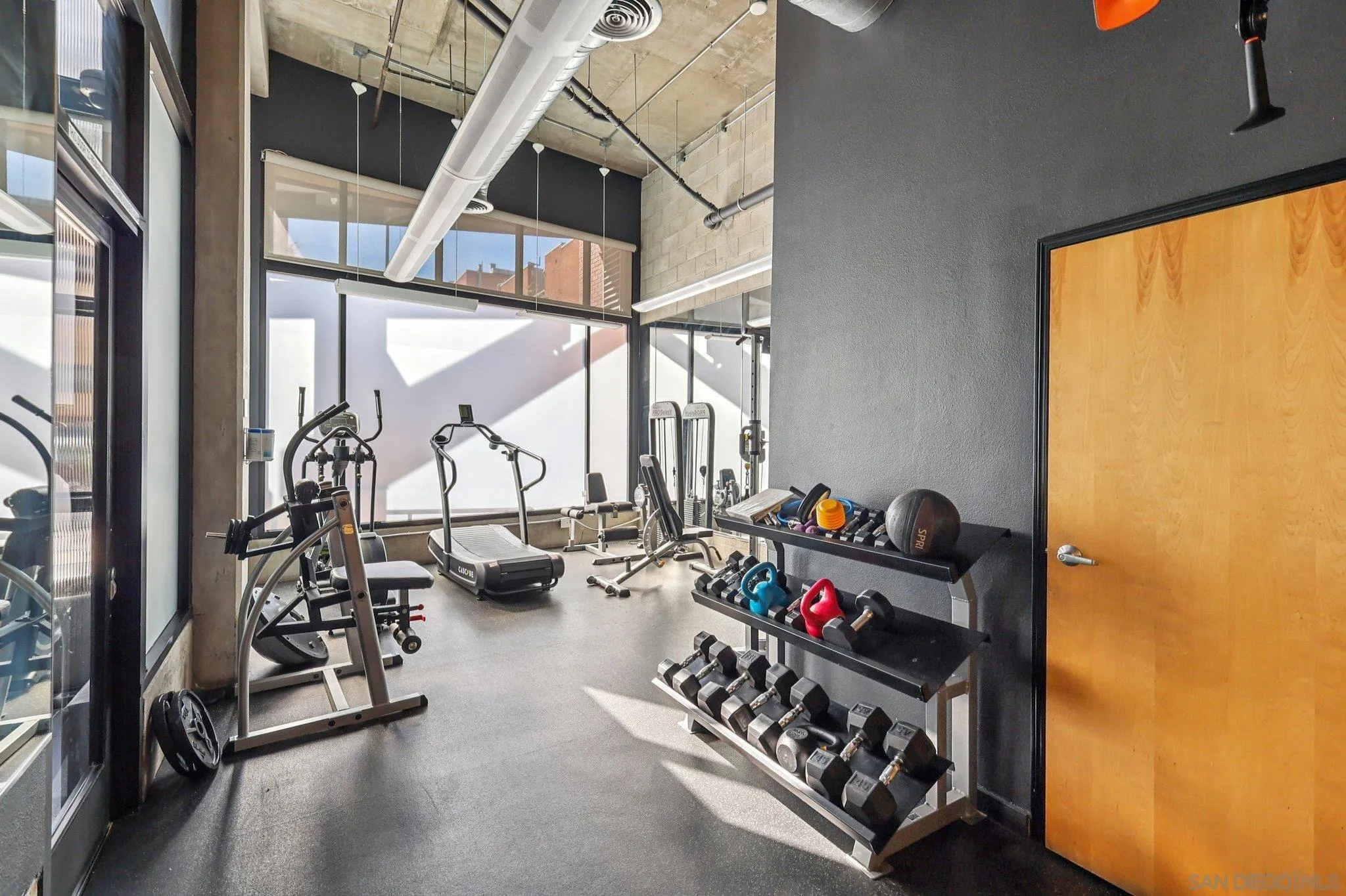 777 Sixth Avenue, Unit 135 San Diego, CA 92101 - Photo 32 of 38 a view of a livingroom with furniture and a large window