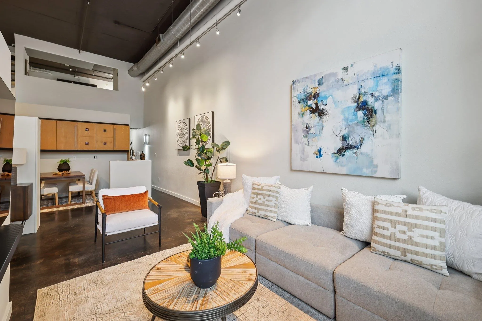 777 Sixth Avenue, Unit 135 San Diego, CA 92101 - Photo 10 of 38 a living room with furniture and a couch