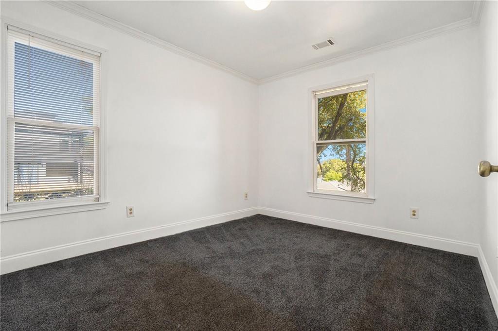 719 Magnolia Street Northwest Atlanta, GA 30314 - Photo 12 of 13 an empty room with window