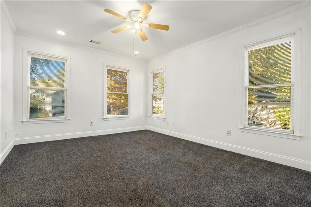 719 Magnolia Street Northwest Atlanta, GA 30314 - Photo 7 of 13 a view of an empty room with a window