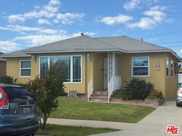 a view of a house with garden