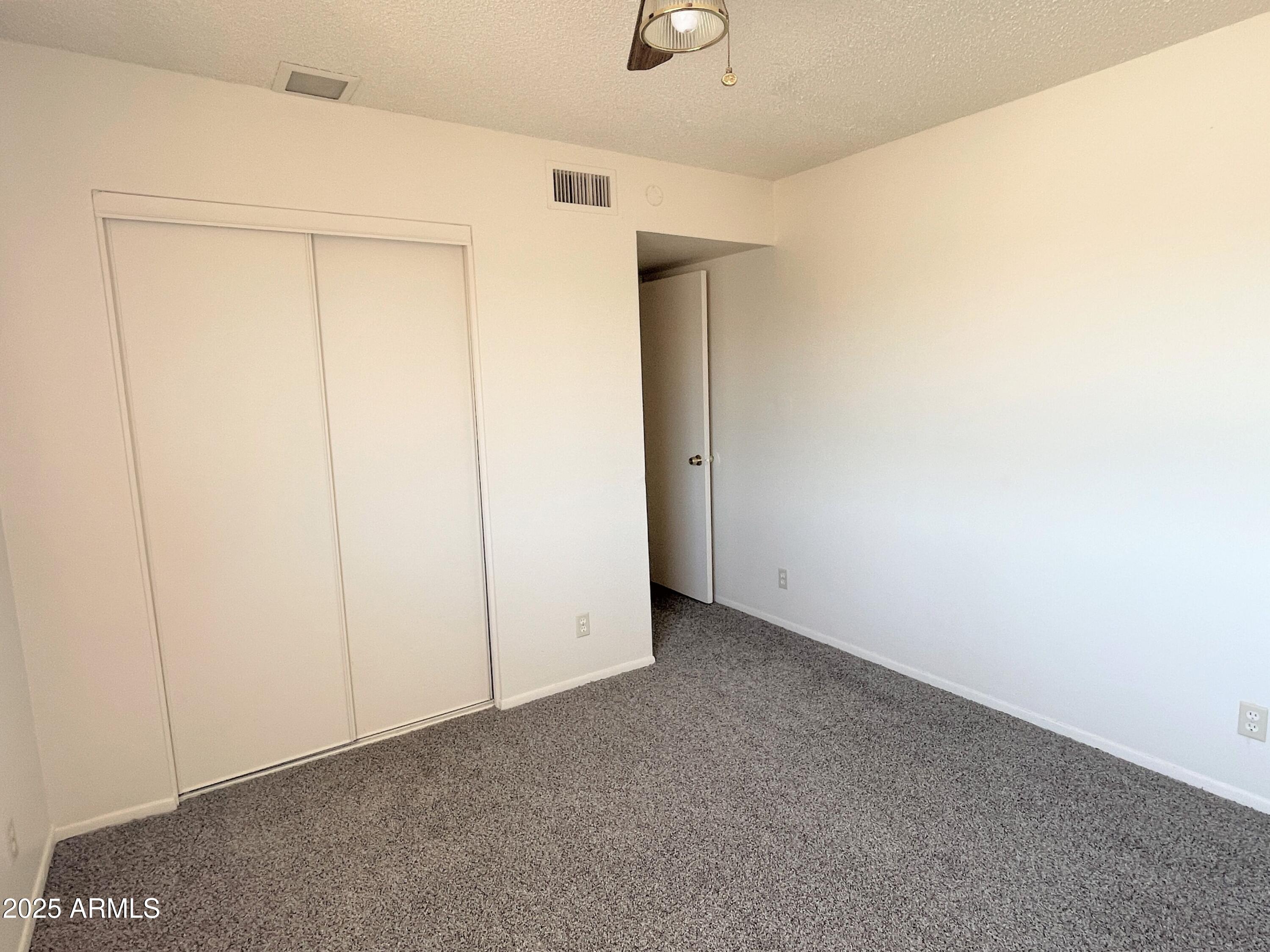 4718 East Portland Street Phoenix, AZ 85008 - Photo 10 of 11 a view of an empty room