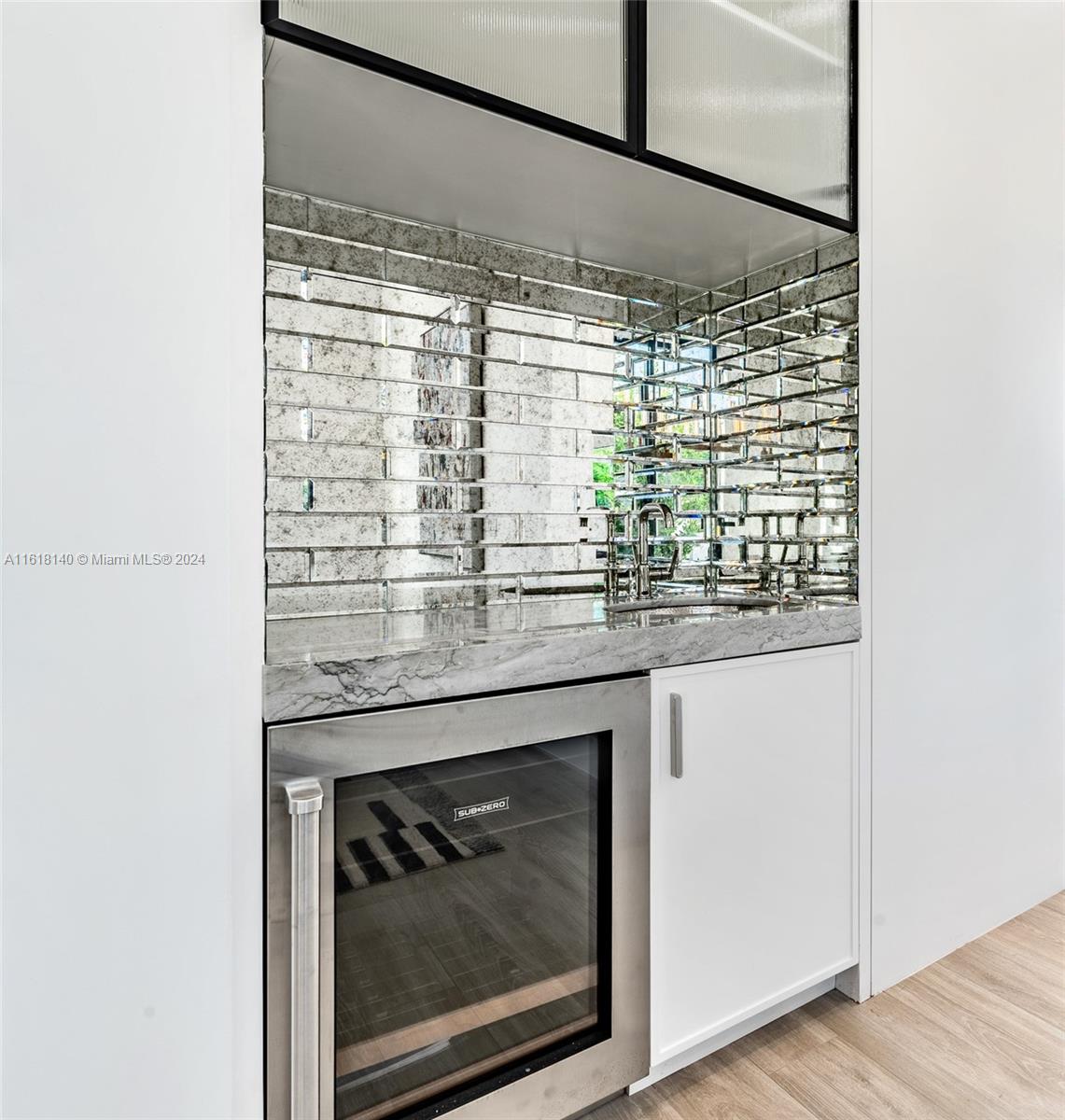 9000 Abbott Avenue Surfside, FL 33154 - Photo 11 of 82 a closeup of a fireplace with a window