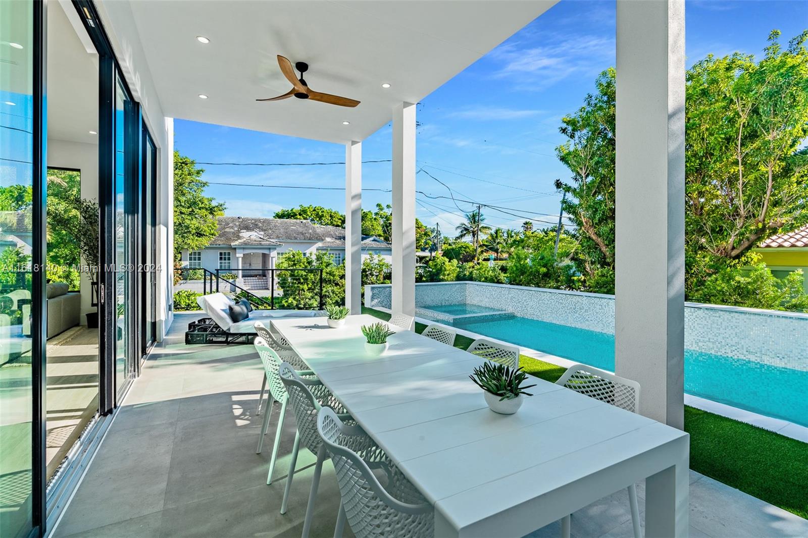 9000 Abbott Avenue Surfside, FL 33154 - Photo 27 of 82 a view of an outdoor dining space with furniture