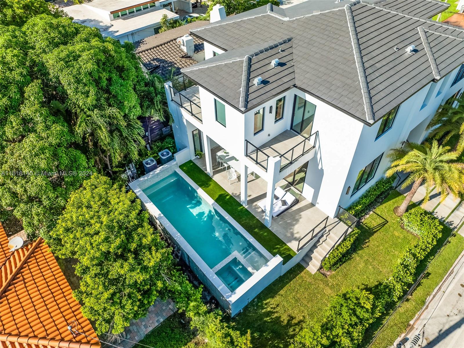9000 Abbott Avenue Surfside, FL 33154 - Photo 3 of 82 an aerial view of a house