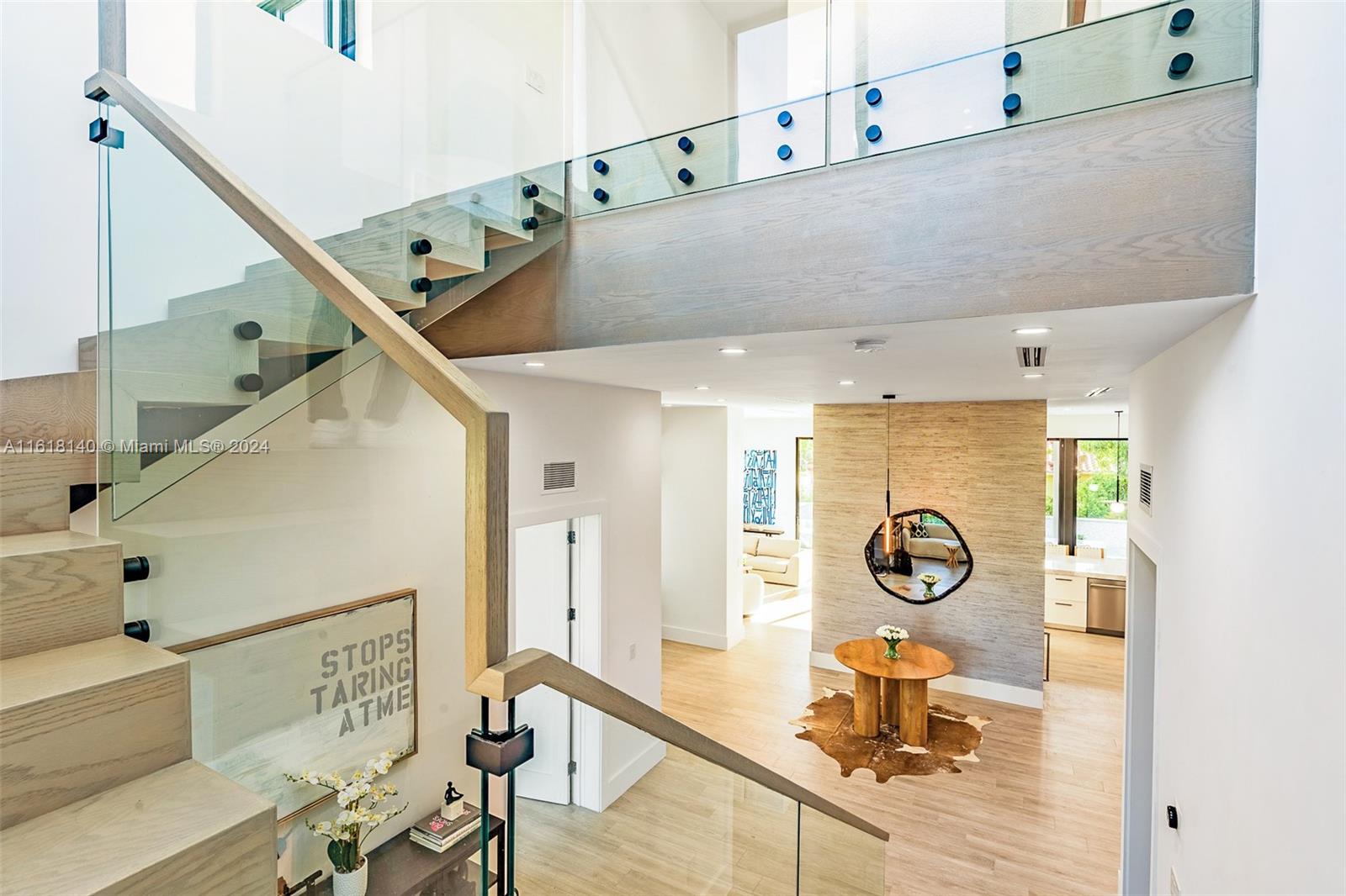 9000 Abbott Avenue Surfside, FL 33154 - Photo 46 of 82 a view of a livingroom with furniture and hardwood floor