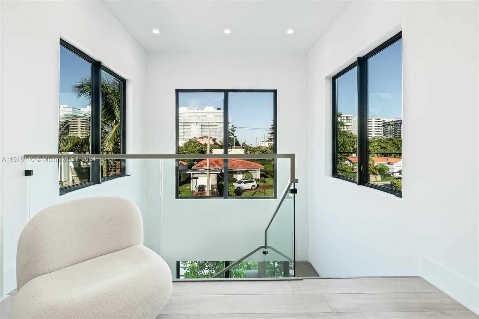 9000 Abbott Avenue Surfside, FL 33154 - Photo 48 of 82 a living room with furniture and window