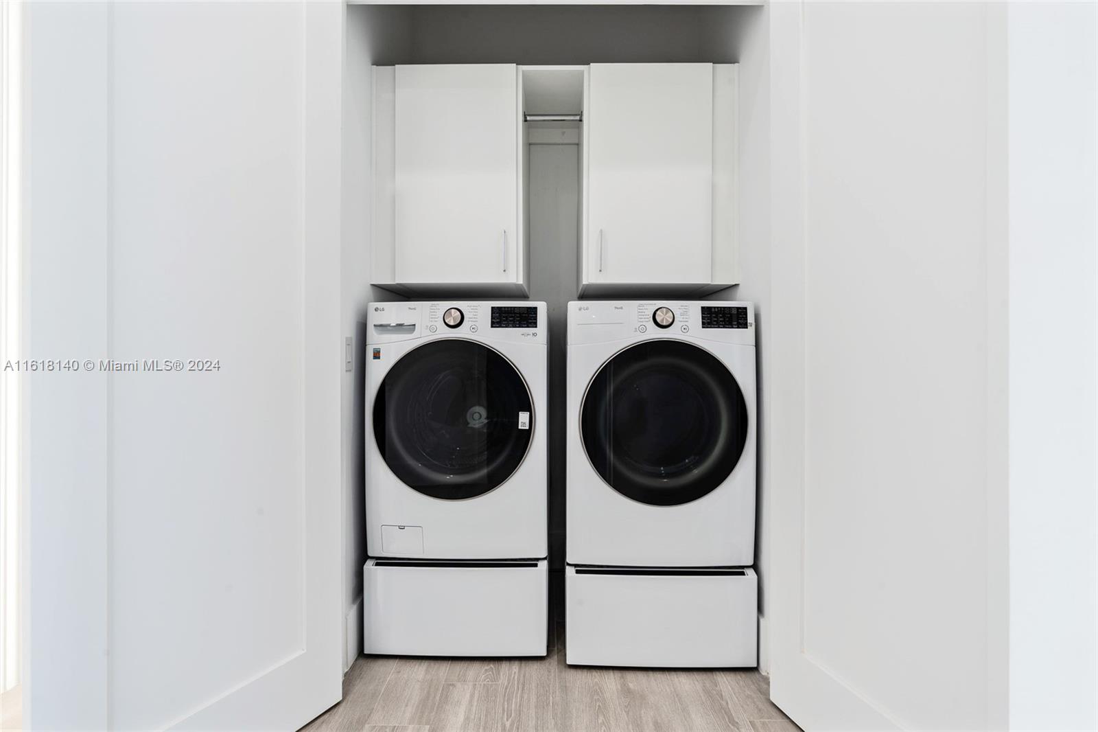 9000 Abbott Avenue Surfside, FL 33154 - Photo 55 of 82 a close up view of a washer and dryer