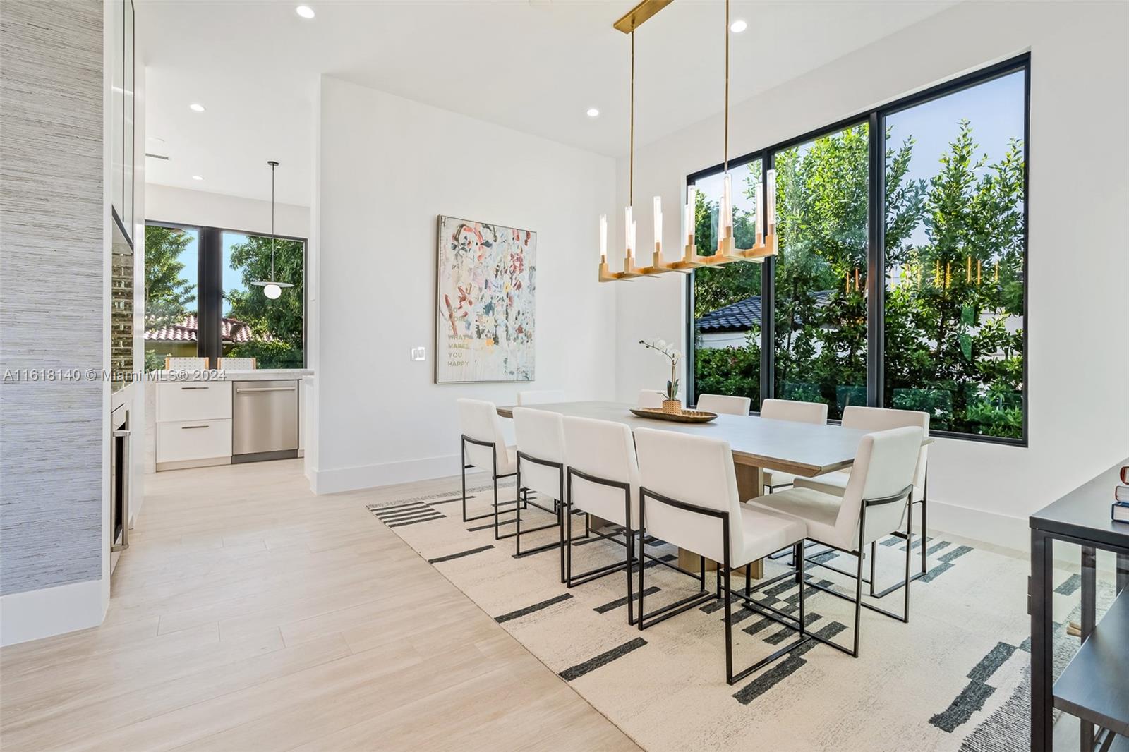9000 Abbott Avenue Surfside, FL 33154 - Photo 9 of 82 a view of a dining room with furniture window and outside view