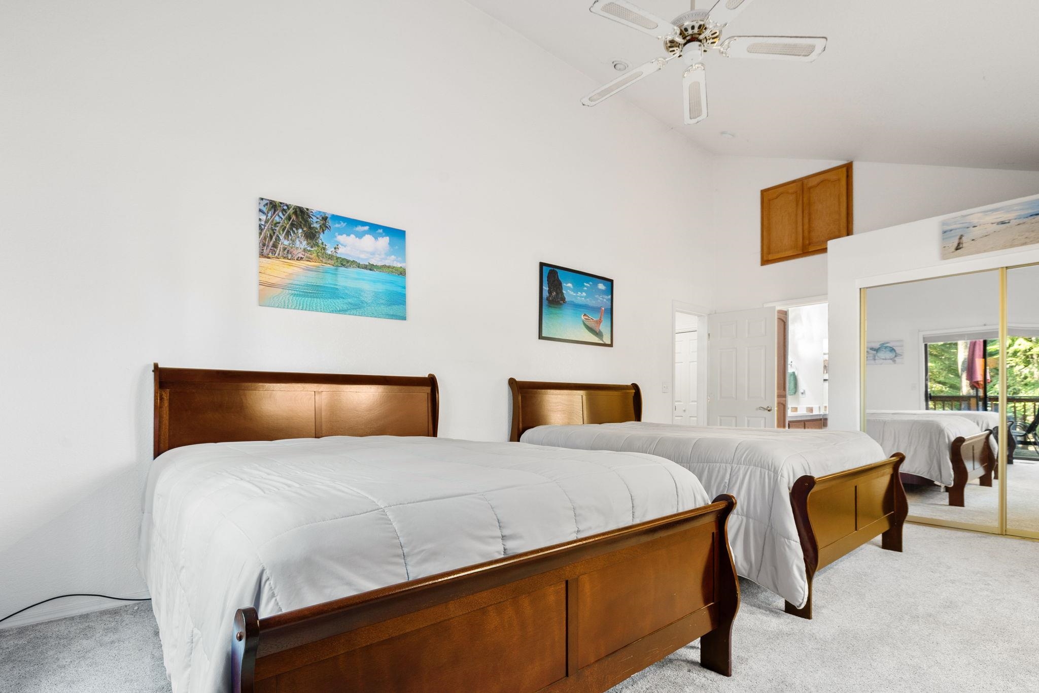 50689 Conifer Drive Soda Springs, CA 95728 - Photo 16 of 28 a bedroom with a bed and ceiling fan