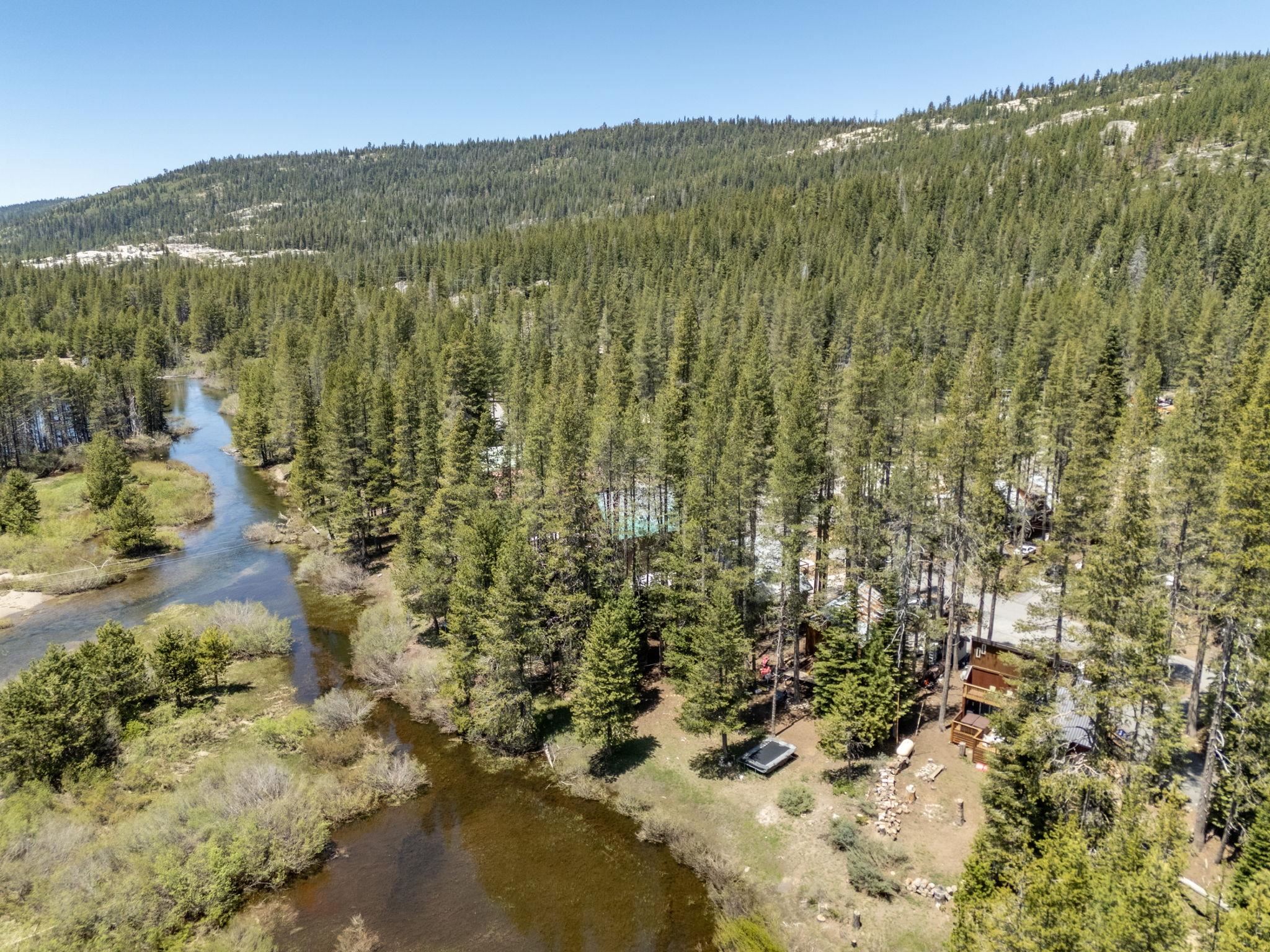 50689 Conifer Drive Soda Springs, CA 95728 - Photo 26 of 28 a view of a forest with a mountain