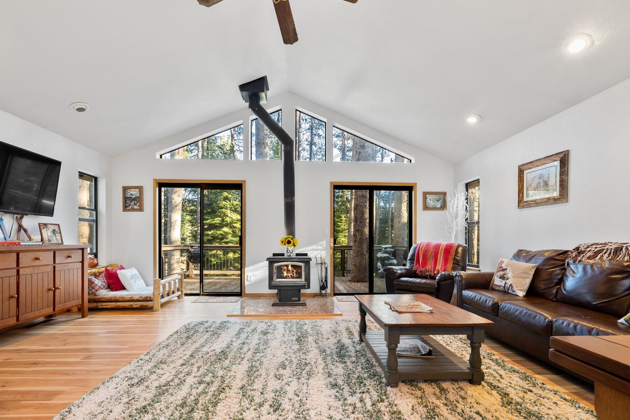 50689 Conifer Drive Soda Springs, CA 95728 - Photo 6 of 28 a living room with furniture and a flat screen tv