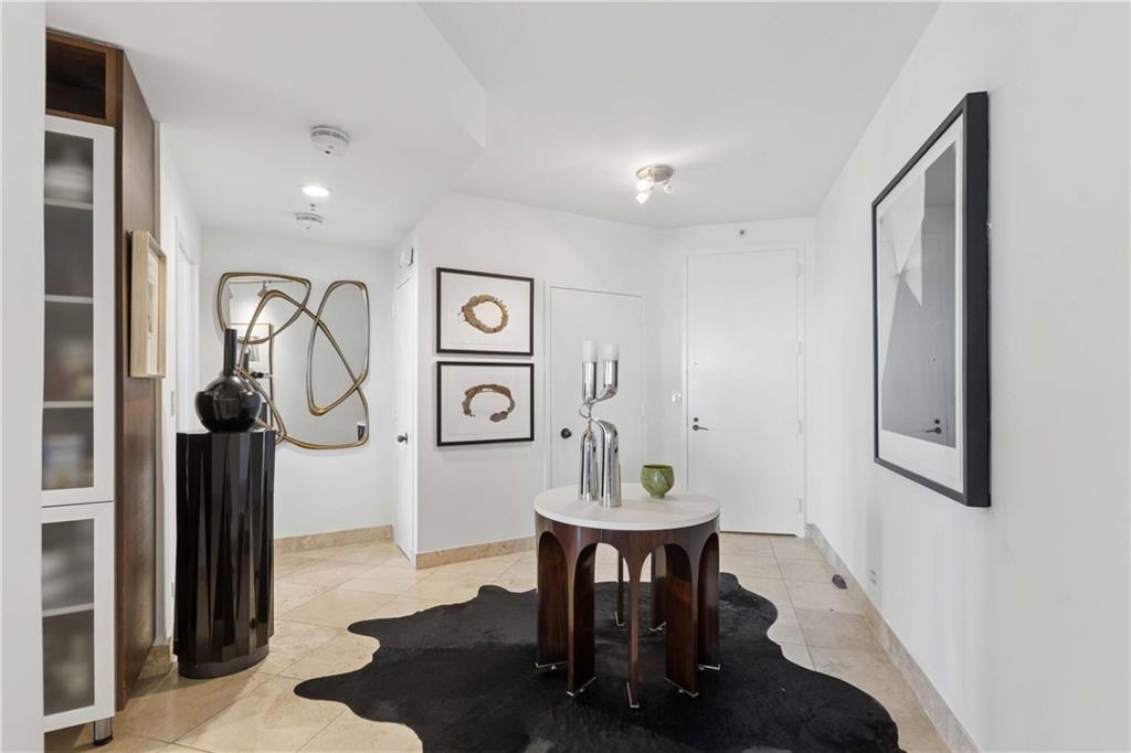 2660 Peachtree Road Northwest, Unit 39D Atlanta, GA 30305 - Photo 2 of 45 a view of a hallway with seating area