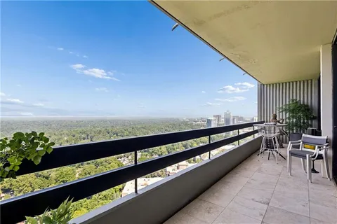 a view of city with a balcony