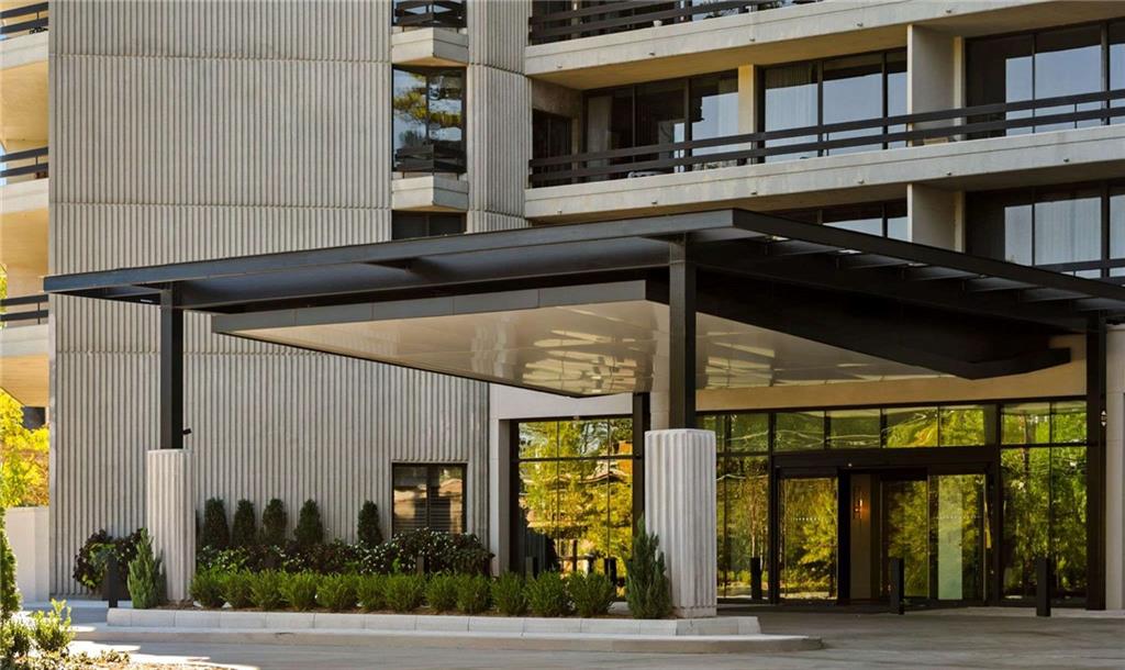 2660 Peachtree Road Northwest, Unit 39D Atlanta, GA 30305 - Photo 38 of 45 a front view of a building with street