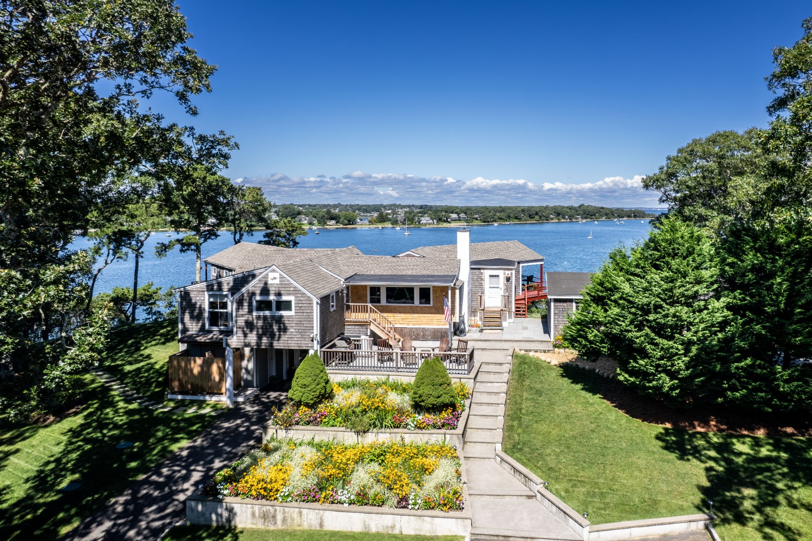 217 Barnes Road Oak Bluffs, MA 02557 - Photo 3 of 60 Updated main home has panoramic views and lovely gardens.