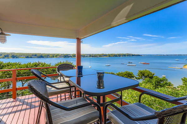 217 Barnes Road Oak Bluffs, MA 02557 - Photo 5 of 60 Water views from the deck off the Great Room stretch to Vineyard Sound and Cape Cod.