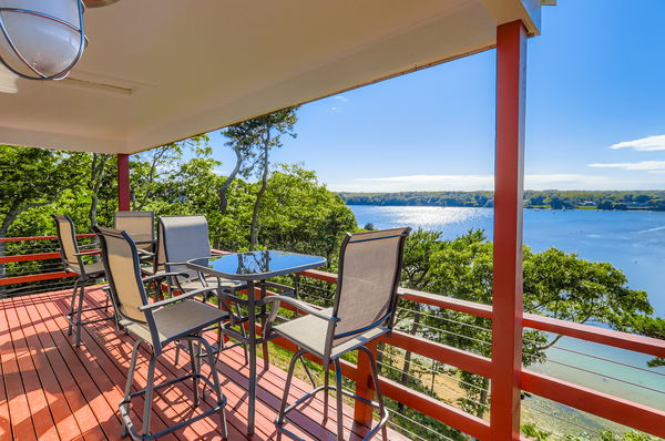 217 Barnes Road Oak Bluffs, MA 02557 - Photo 6 of 60 Water views from the private deck off the primary bedroom.