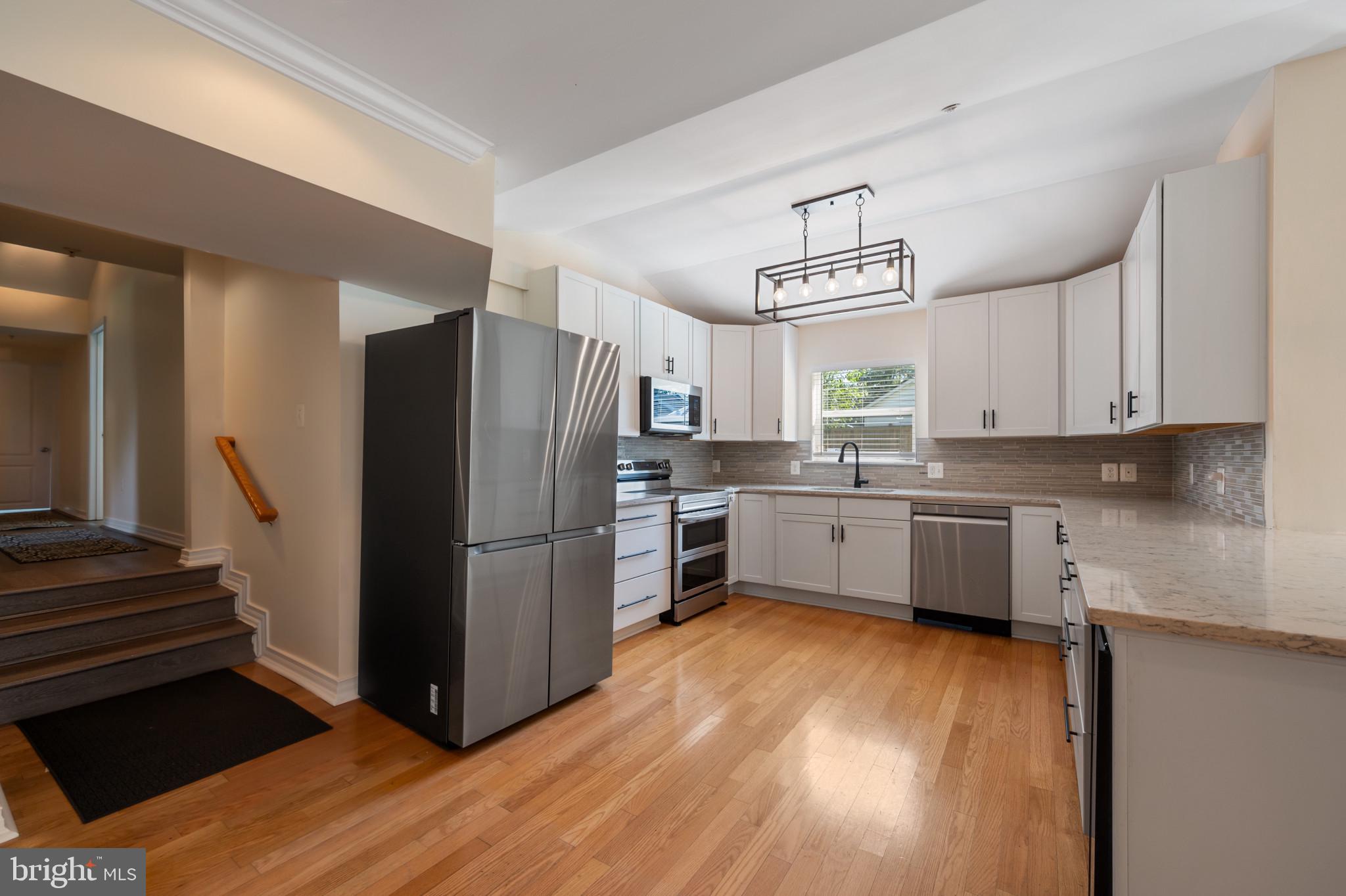 5518 Lanham Station Road Lanham, MD 20706 - Photo 4 of 30 Modern Kitchen w/ SS Appliances
