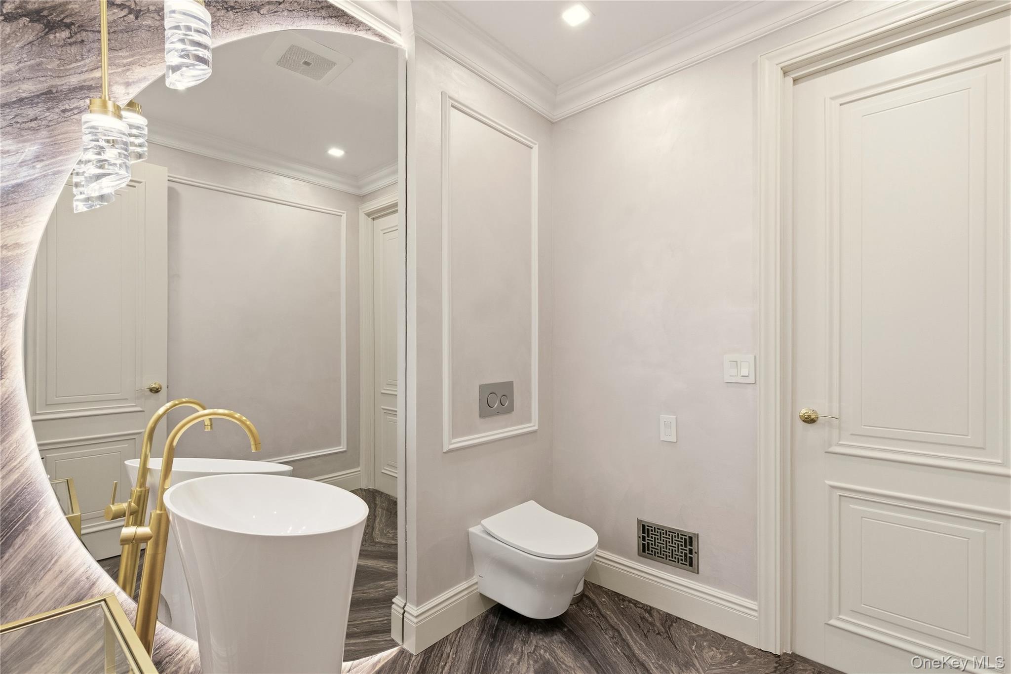 55 Coves Run Syosset, NY 11791 - Photo 18 of 50 a bathroom with a toilet a sink and shower