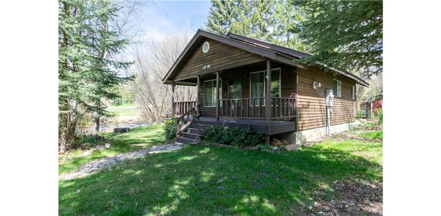 1105 Litz Road Preston, ID 83263 - Photo 1 of 24 Chalet / cabin with a porch and a front yard