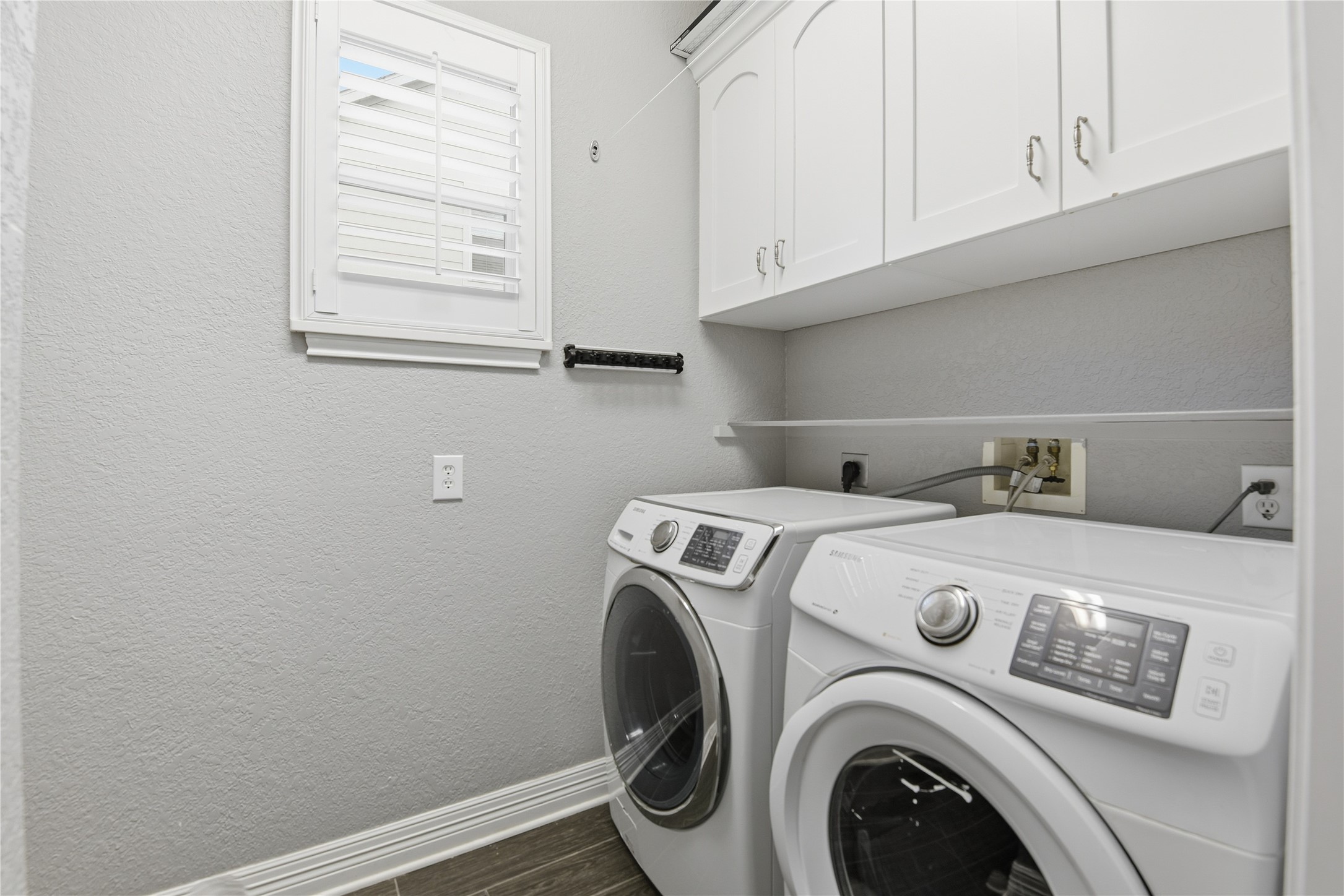 3130 Red Maple Drive Friendswood, TX 77546 - Photo 21 of 26 a utility room with dryer and washer