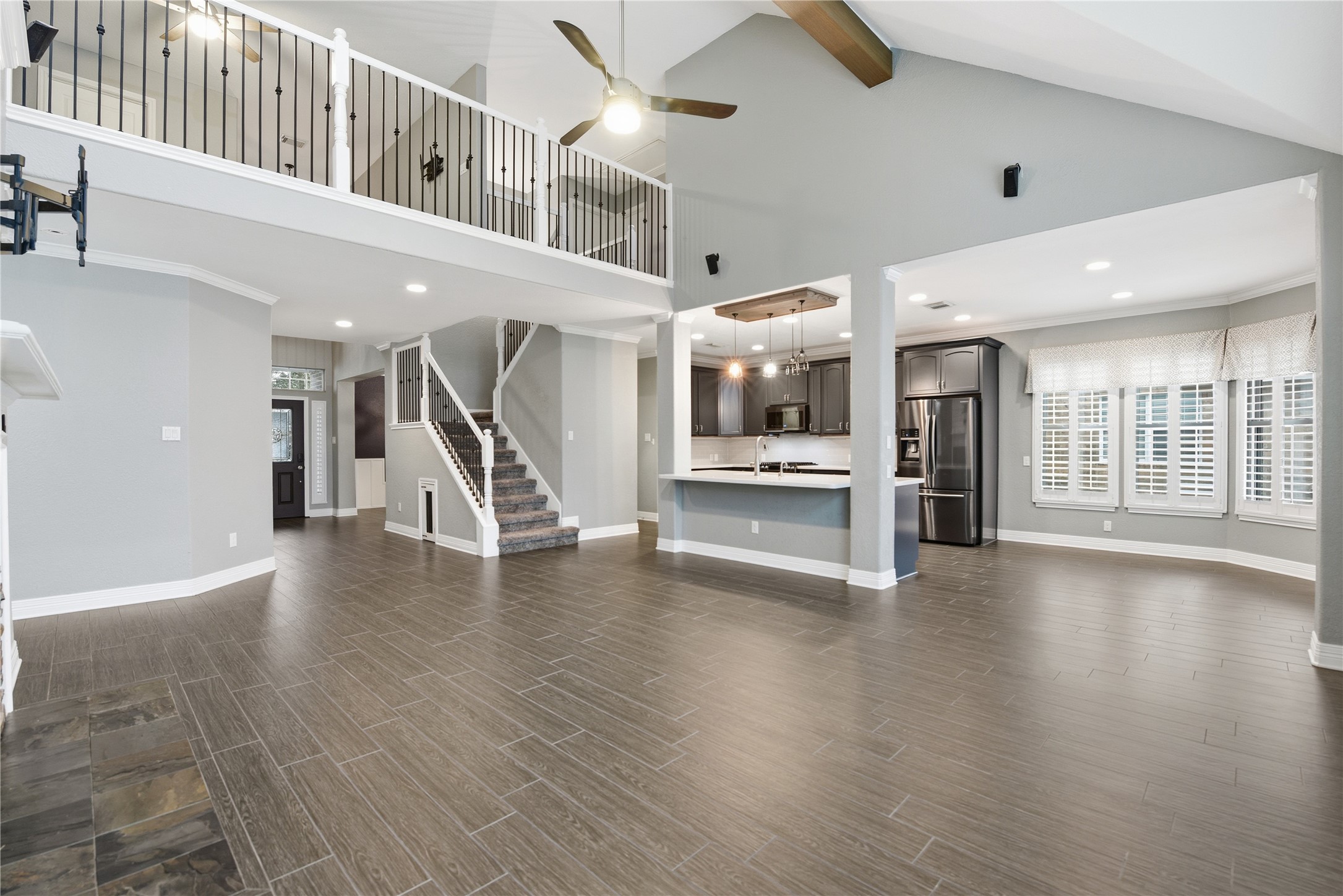 3130 Red Maple Drive Friendswood, TX 77546 - Photo 5 of 26 a view of an entryway with wooden floor