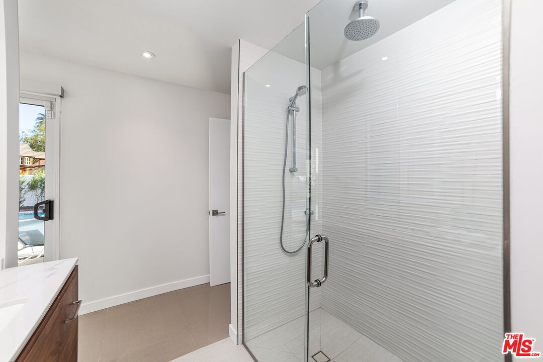 975 East Sunny Dunes Road Palm Springs, CA 92264 - Photo 27 of 40 a bathroom with a shower