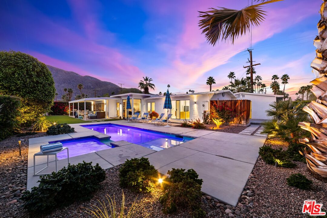 975 East Sunny Dunes Road Palm Springs, CA 92264 - Photo 34 of 40 a view of swimming pool with outdoor seating