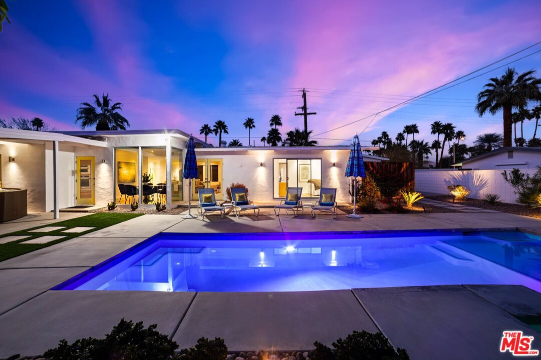 975 East Sunny Dunes Road Palm Springs, CA 92264 - Photo 35 of 40 a room with lots of gym equipment