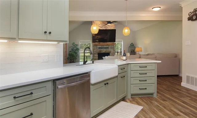 a bathroom with a sink vanity and a mirror