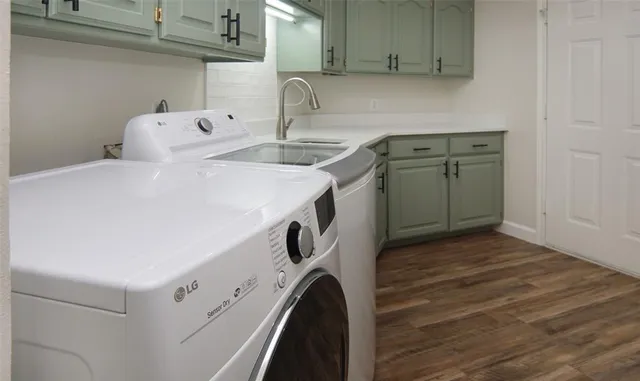 a utility room with dryer and washer
