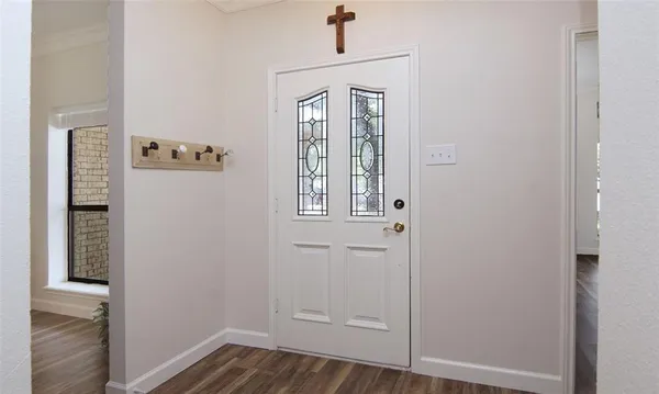 wooden floor and window in a room