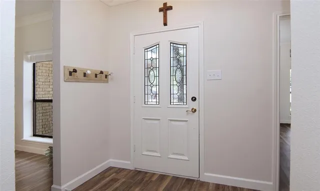 wooden floor and window in a room