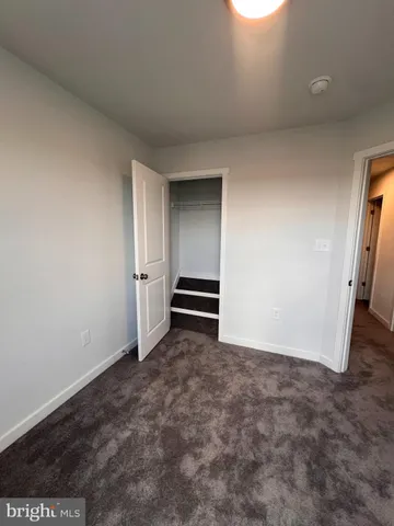 an empty room with a natural light