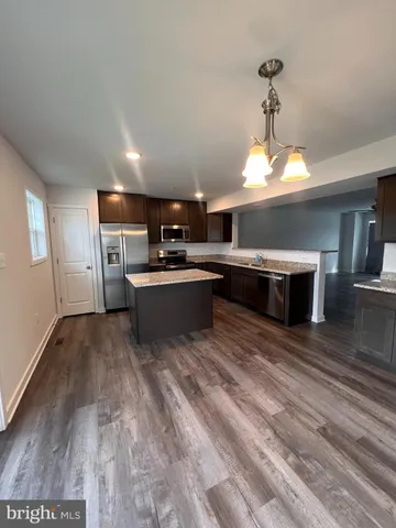 a view of kitchen and microwave