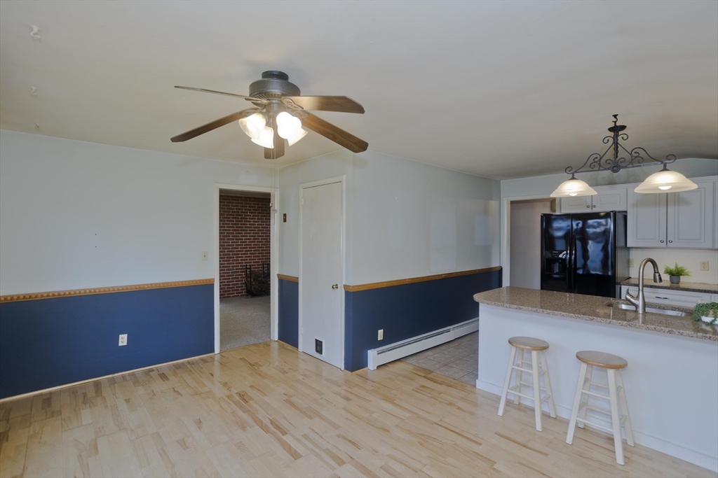 151 Bemis Road Holyoke, MA 01040 - Photo 13 of 42 a bedroom with furniture and a chandelier fan